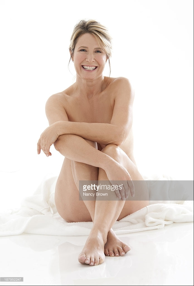 mature woman nude pics mature nude photos woman picture photo sitting posing age middle stock getty
