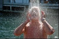 shower mature preview mature man taking cold shower after swim harbor bath